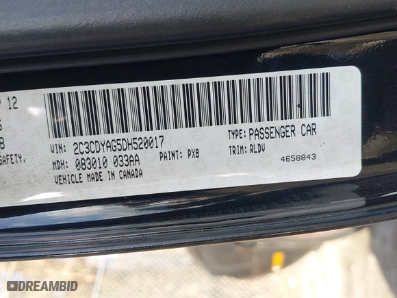 2013 Dodge Challenger SXT with VIN 2C3CDYAG5DH520017, listed as a IAAI auction lot 41882517 with 128,854 mi miles. Bid and sale history available at carsss.com. Image 9.