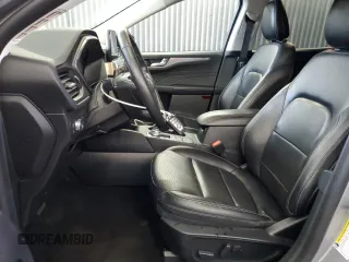 2021 Ford Escape Titanium Plug-In Hybrid z VIN 1FMCU0LZ8MUA66995, wystawiony jako Copart lot #60986765 z przebiegiem 69 609 mil mil oraz Czysty tytuł • Clean title. Historia ofert i sprzedaży dostępna na DreamBid. Obrazek 7.