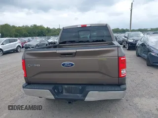 2015 Ford F-150 XLT with VIN 1FTEW1EP1FFC72160, listed as a IAAI auction lot 40351662 with 142,647 mi miles. Bid and sale history available at carsss.com. Image 16.