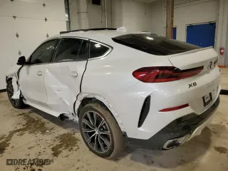 2020 BMW X6 xDrive40i with VIN 5UXCY6C07L9B43453, listed as a Copart auction lot 52096845 with 0 mi miles and Salvage Title. Bid and sale history available at carsss.com. Image 2.