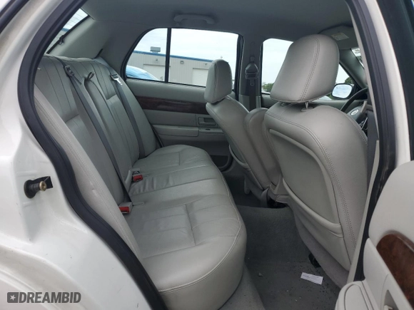 2004 Mercury Grand Marquis LS Premium with VIN 2MEFM75W34X667347, listed as a Copart auction lot 61209224 with 129,345 mi miles and Salvage Title. Bid and sale history available at carsss.com. Image 11.