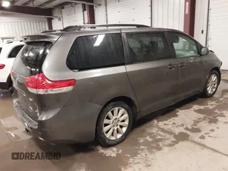 2011 Toyota Sienna LE with VIN 5TDJK3DC2BS013045, listed as a IAAI auction lot 41127037 with 239,401 mi miles. Bid and sale history available at carsss.com. Image 4.