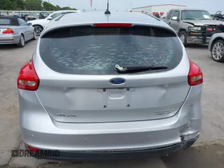 2015 Ford Focus Titanium with VIN 1FADP3N23FL356822, listed as a IAAI auction lot 41981053 with 115,584 mi miles and . Bid and sale history available at DreamBid. Image 17.