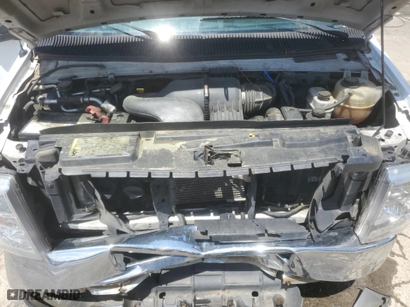 2012 Ford Econoline Wagon XL with VIN 1FBSS3BL5CDA01156, listed as a Copart auction lot 50744455 with 386,889 mi miles and Salvage Title. Bid and sale history available at carsss.com. Image 12.