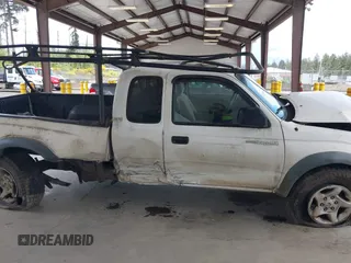 2001 Toyota Tacoma z VIN 5TEWN72N11Z733480, wystawiony jako IAAI lot #42244484 z przebiegiem 323 454 mil mil oraz . Historia ofert i sprzedaży dostępna na DreamBid. Obrazek 14.