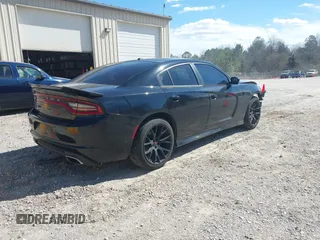 2019 Dodge Charger SXT with VIN 2C3CDXBG6KH702928, listed as a IAAI auction lot 41691312 with 108,832 mi miles and . Bid and sale history available at DreamBid. Image 4.