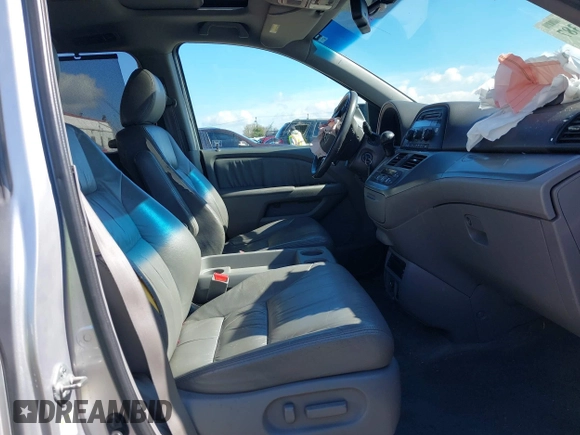2010 Honda Odyssey EX-L with VIN 5FNRL3H78AB006181, listed as a IAAI auction lot 38906387 with 171,426 mi miles and . Bid and sale history available at DreamBid. Image 5.