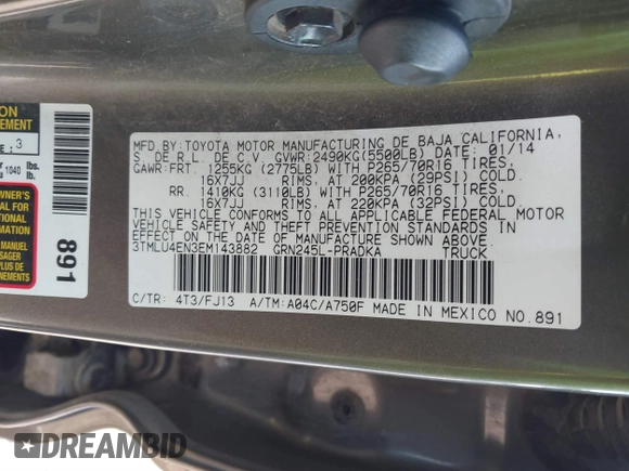 2014 Toyota Tacoma with VIN 3TMLU4EN3EM143882, listed as a IAAI auction lot 40657975 with 125,008 mi miles. Bid and sale history available at carsss.com. Image 9.