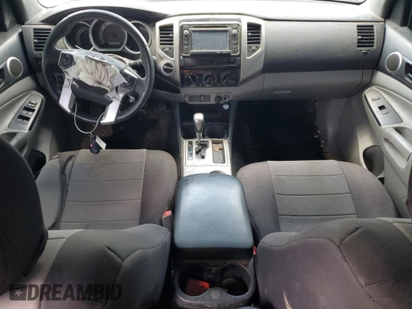 2014 Toyota Tacoma with VIN 5TFMU4FN3EX025697, listed as a Copart auction lot 62146895 with 133,028 mi miles and Salvage title. Bid and sale history available at DreamBid. Image 8.