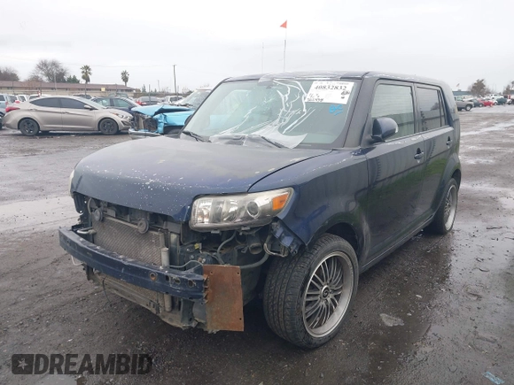 2008 Scion xB with VIN JTLKE50E281049021, listed as a IAAI auction lot 40832832 with 262,438 mi miles. Bid and sale history available at carsss.com. Image 2.