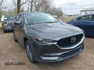 2020 Mazda CX-5 Touring with VIN JM3KFBCM1L0792396, listed as a IAAI auction lot 41949124 with 118,280 mi miles. Bid and sale history available at carsss.com. Image 1.