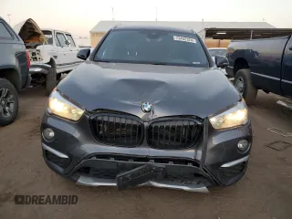 2018 BMW X1 xDrive28i with VIN WBXHT3C38J3H33310, listed as a Copart auction lot 73492324 with 88,620 mi miles and Salvage Title. Bid and sale history available at carsss.com. Image 5.