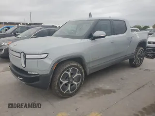 2022 Rivian R1T Adventure z VIN 7FCTGAAA0NN014488, wystawiony jako Copart lot #51024514 z przebiegiem 18 721 mil mil oraz Szkody całkowita. Historia ofert i sprzedaży dostępna na DreamBid. Obrazek 1.