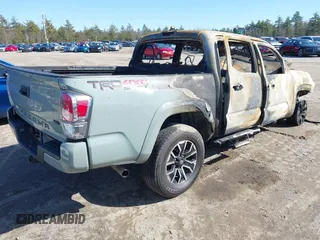 2023 Toyota Tacoma SR z VIN 3TYCZ5AN2PT132764, wystawiony jako IAAI lot #41832334 z przebiegiem 200 000 mil mil oraz . Historia ofert i sprzedaży dostępna na DreamBid. Obrazek 4.