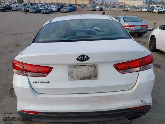 2016 Kia Optima LX with VIN 5XXGT4L34GG084299, listed as a IAAI auction lot 39779795 with 237,126 mi miles. Bid and sale history available at carsss.com. Image 16.