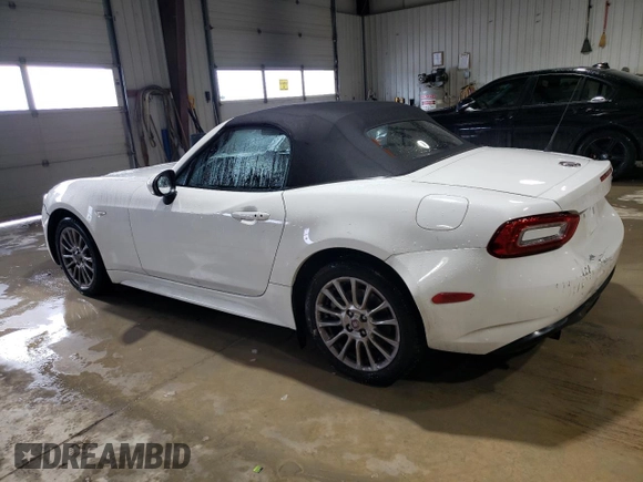 2017 FIAT 124 Spider Lusso z VIN JC1NFAEK5H0106151, wystawiony jako Copart lot #88738865 z przebiegiem 81 333 mil mil oraz Szkoda całkowita • Salvage title. Historia ofert i sprzedaży dostępna na DreamBid. Obrazek 2.