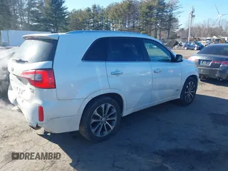 2014 Kia Sorento SX with VIN 5XYKWDA72EG452494, listed as a IAAI auction lot 41690977 with 143,099 mi miles. Bid and sale history available at carsss.com. Image 4.