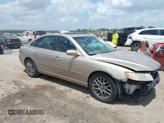 2006 Hyundai Azera SE with VIN KMHFC46F56A052338, listed as a IAAI auction lot 42546156 with 165,535 mi miles and . Bid and sale history available at DreamBid. Image 1.