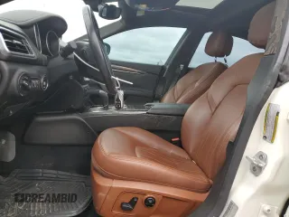 2018 Maserati Ghibli z VIN ZAM57XSA9J1271727, wystawiony jako Copart lot #52155305 z przebiegiem 62 081 mil mil oraz Szkoda całkowita • Salvage title. Historia ofert i sprzedaży dostępna na DreamBid. Obrazek 7.