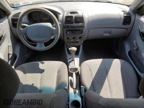 2005 Hyundai Accent GLS with VIN KMHCG45C35U622963, listed as a Copart auction lot 68292114 with 137,655 mi miles and Salvage Title. Bid and sale history available at carsss.com. Image 8.