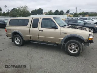 1999 Ford Ranger XLT with VIN 1FTZR15X6XPB58756, listed as a Copart auction lot 58839535 with 127,860 mi miles and Salvage title. Bid and sale history available at DreamBid. Image 4.