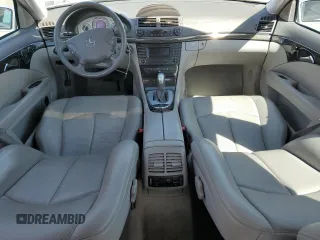 2003 Mercedes-Benz E-Class 5.0L with VIN WDBUF70J63A189963, listed as a Copart auction lot 50898675 with 130,264 mi miles and Salvage Title. Bid and sale history available at carsss.com. Image 8.