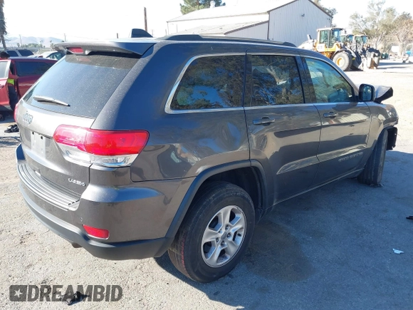 2017 Jeep Grand Cherokee Laredo with VIN 1C4RJEAG8HC944037, listed as a IAAI auction lot 41299619 with 140,405 mi miles. Bid and sale history available at carsss.com. Image 4.