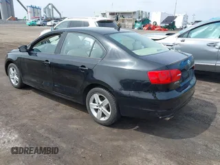 2012 Volkswagen Jetta Sedan TDI w/Premium & Nav with VIN 3VWLL7AJXCM026589, listed as a IAAI auction lot 41870945 with 72,544 mi miles. Bid and sale history available at carsss.com. Image 3.