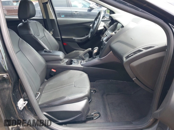 2014 Ford Focus Titanium with VIN 1FADP3N2XEL319782, listed as a IAAI auction lot 42615481 with 132,423 mi miles and . Bid and sale history available at DreamBid. Image 5.
