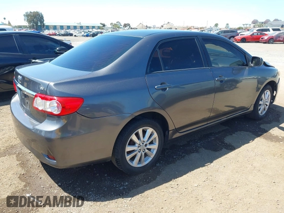 2011 Toyota Corolla L with VIN 2T1BU4EE7BC738640, listed as a IAAI auction lot 42024474 with 164,322 mi miles. Bid and sale history available at carsss.com. Image 4.