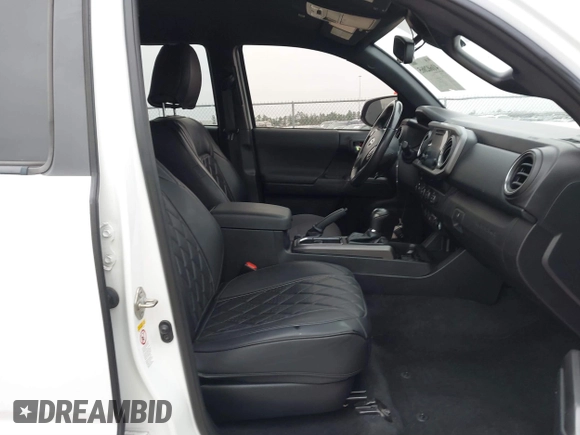 2019 Toyota Tacoma SR z VIN 3TMCZ5AN4KM220154, wystawiony jako IAAI lot #41602065 z przebiegiem 92 345 mil mil oraz . Historia ofert i sprzedaży dostępna na DreamBid. Obrazek 5.