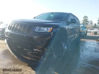 2014 Jeep Grand Cherokee Laredo with VIN 1C4RJFAG5EC264386, listed as a IAAI auction lot 41649725 with 146,814 mi miles. Bid and sale history available at carsss.com. Image 16.