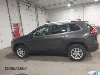 2014 Jeep Cherokee Altitude with VIN 1C4PJMCB2EW317346, listed as a IAAI auction lot 41861651 with 100,602 mi miles. Bid and sale history available at carsss.com. Image 14.