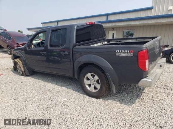 2010 Nissan Frontier LE with VIN 1N6AD0EV3AC407062, listed as a Copart auction lot 60444785 with 96,631 mi miles and Salvage title. Bid and sale history available at DreamBid. Image 2.