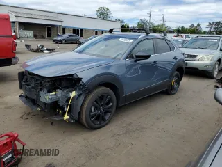 2022 Mazda CX-30 S Carbon Edition с VIN 3MVDMBCL7NM408036, выставлен на аукционе Copart как лот 56683665 с пробегом 82 337 миль миль и Списание • Salvage title. История ставок и продаж доступна на DreamBid. Изображение 1.