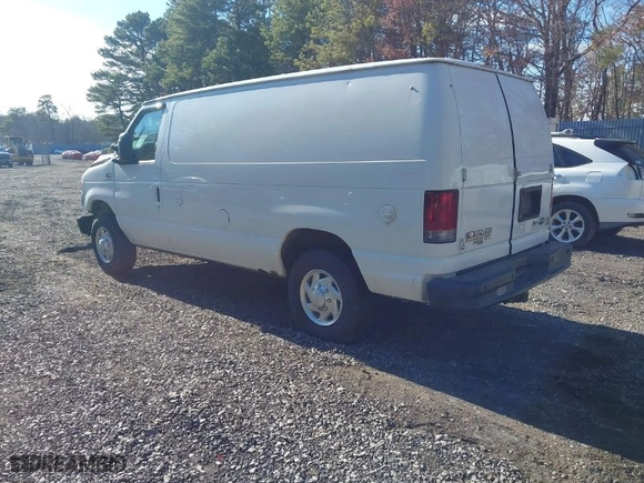 2012 Ford Econoline Cargo Van Commercial with VIN 1FTNE2EL7CDA53538, listed as a IAAI auction lot 41697483 with 142,154 mi miles. Bid and sale history available at carsss.com. Image 3.