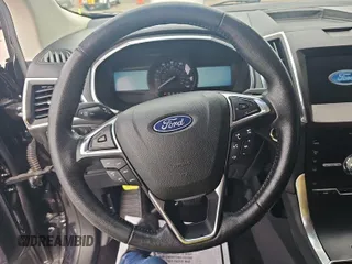 2020 Ford Edge Titanium z VIN 2FMPK3K91LBA60874, wystawiony jako IAAI lot #42470865 z przebiegiem 94 048 mil mil oraz . Historia ofert i sprzedaży dostępna na DreamBid. Obrazek 2.