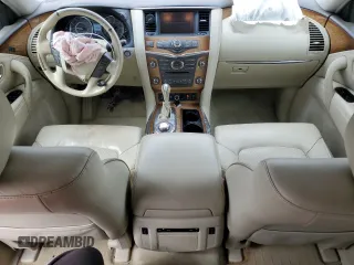 2012 Infiniti QX56 7-passenger z VIN JN8AZ2NE5C9021621, wystawiony jako Copart lot #53484825 z przebiegiem 139 453 mil mil oraz Szkoda całkowita • Salvage title. Historia ofert i sprzedaży dostępna na DreamBid. Obrazek 8.