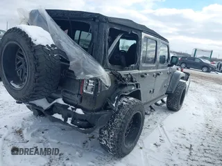 2018 Jeep Wrangler Unlimited Sport S z VIN 1C4HJXDG4JW228078, wystawiony jako IAAI lot #41381520 z przebiegiem 58 899 mil mil oraz . Historia ofert i sprzedaży dostępna na DreamBid. Obrazek 4.