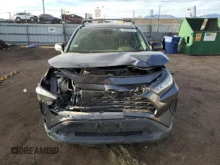 2019 Toyota RAV4 LE with VIN JTMF1RFV0KJ018803, listed as a Copart auction lot 49893715 with 77,595 mi miles and Salvage Title. Bid and sale history available at DreamBid. Image 5.