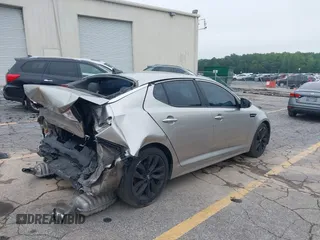 2015 Kia Optima SX with VIN 5XXGR4A73FG372494, listed as a IAAI auction lot 42345043 with 196,911 mi miles and . Bid and sale history available at DreamBid. Image 4.