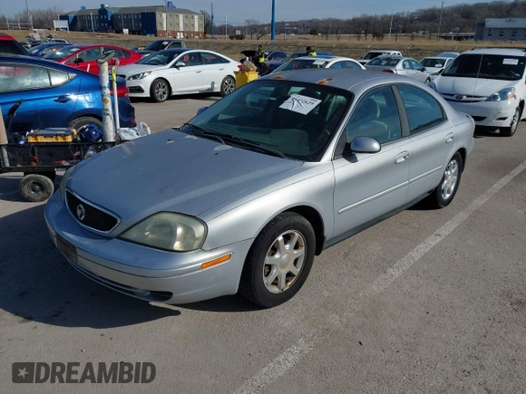 2003 Mercury Sable GS z VIN 1MEFM50U23A618707, wystawiony jako IAAI lot #41472629 z przebiegiem 172 377 mil mil oraz . Historia ofert i sprzedaży dostępna na DreamBid. Obrazek 2.
