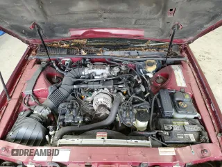 1997 Mercury Cougar z VIN 1MELM62WXVH603342, wystawiony jako Copart lot #56543965 z przebiegiem 151 497 mil mil oraz Czysty tytuł • Clean title. Historia ofert i sprzedaży dostępna na DreamBid. Obrazek 11.