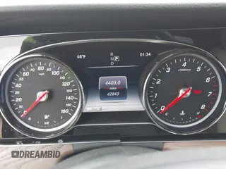 2018 Mercedes-Benz E 300 with VIN WDDZF4JBXJA477047, listed as a IAAI auction lot 42075763 with 62,843 mi miles and . Bid and sale history available at DreamBid. Image 7.