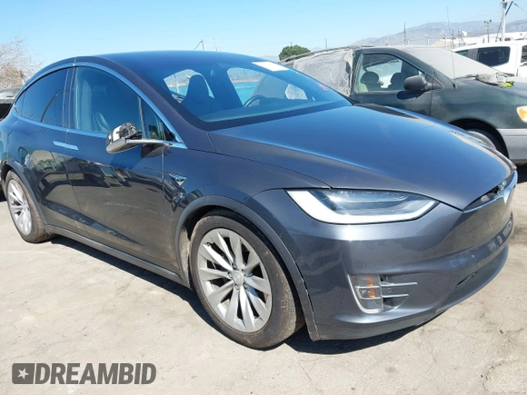 2018 Tesla Model X 75D with VIN 5YJXCBE26JF121937, listed as a IAAI auction lot 41652666 with 93,478 mi miles and . Bid and sale history available at carsss.com. Image 1.