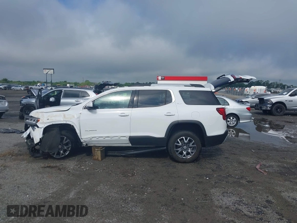2023 GMC Acadia SLT with VIN 1GKKNML4XPZ156685, listed as a IAAI auction lot 42231988 with 61,094 mi miles and . Bid and sale history available at DreamBid. Image 14.
