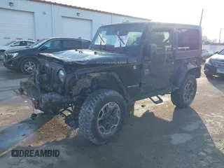 2009 Jeep Wrangler Rubicon with VIN 1J8GA641X9L706706, listed as a IAAI auction lot 41520129 with 176,345 mi miles. Bid and sale history available at carsss.com. Image 2.