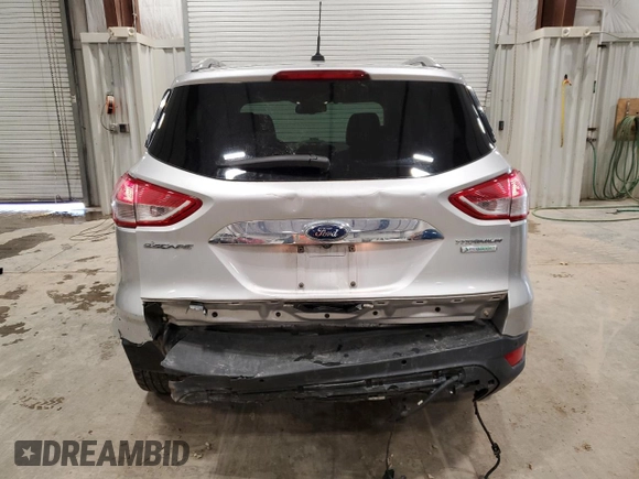 2016 Ford Escape Titanium with VIN 1FMCU0JX2GUB31832, listed as a Copart auction lot 49142115 with 105,400 mi miles and Clean Title. Bid and sale history available at carsss.com. Image 6.