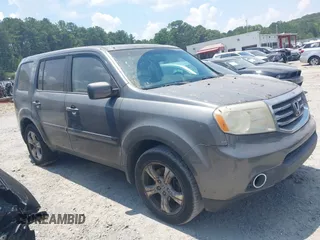 2012 Honda Pilot EX-L with VIN 5FNYF3H69CB031071, listed as a IAAI auction lot 42676827 with 203,749 mi miles and . Bid and sale history available at DreamBid. Image 1.