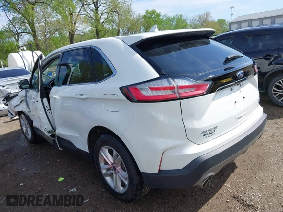 2020 Ford Edge SEL z VIN 2FMPK4J9XLBA07663, wystawiony jako IAAI lot #42115904 z przebiegiem 45 385 mil mil oraz . Historia ofert i sprzedaży dostępna na DreamBid. Obrazek 3.